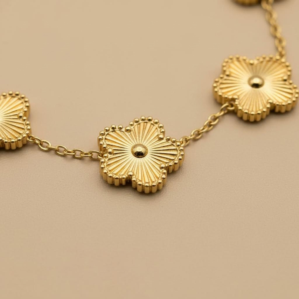Gold Floral Charm Bracelet – Sunburst Design