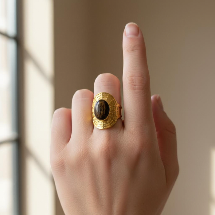 Gold Signet Ring with Oval Black Stone