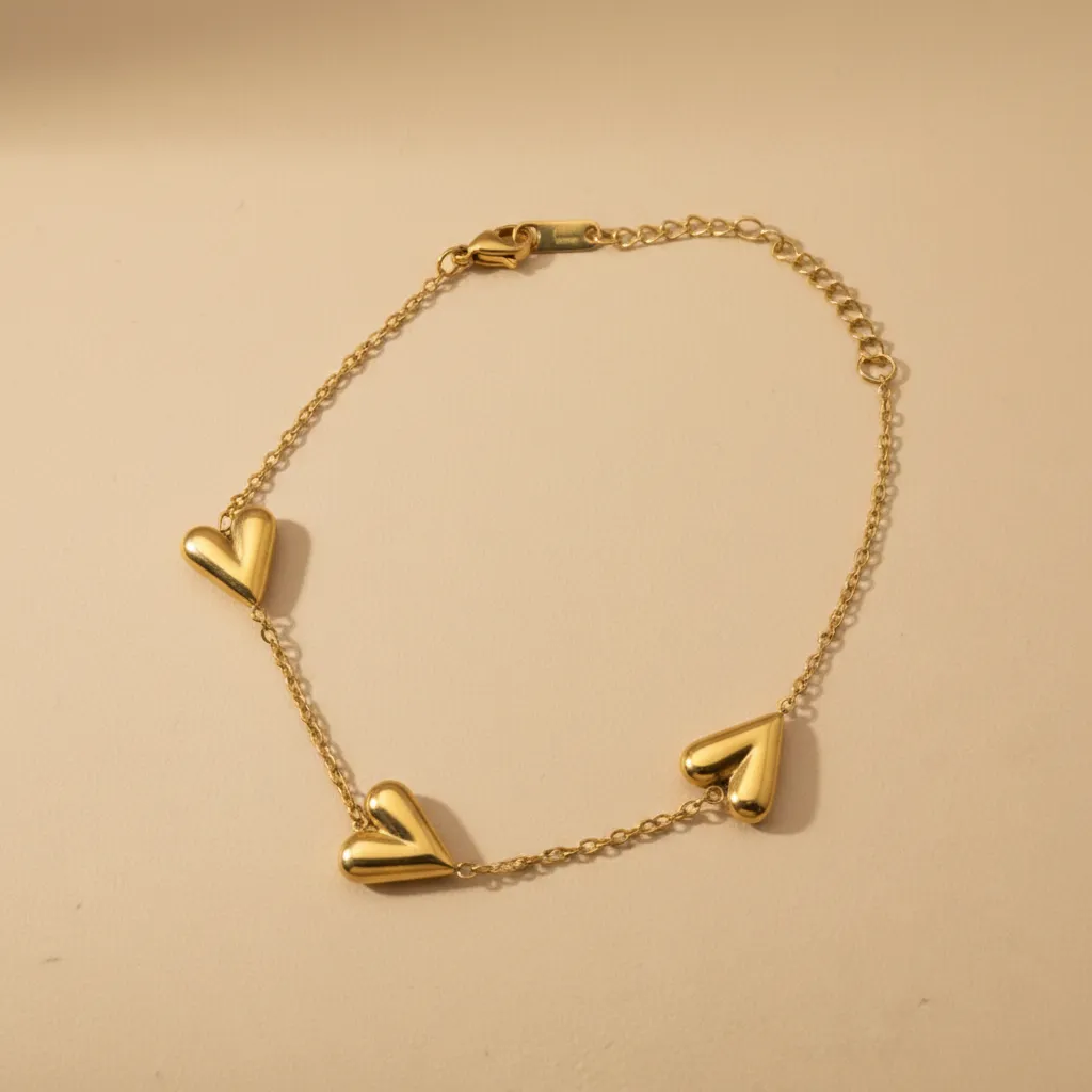 Gold Triple Heart Bracelet – Minimal Adjustable Chain Design