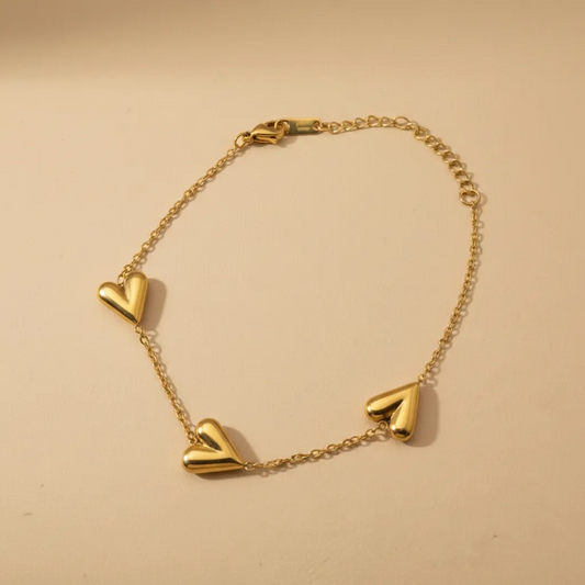 Gold Triple Heart Bracelet – Minimal Adjustable Chain Design